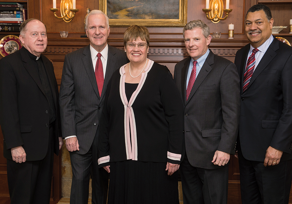 Professor Patricia McCoy with, from left, BC President William P. Leahy, SJ, past and present Liberty Mutual senior vice presidents Christopher Mansfield ’75 and James Kelleher, and Dean Vincent Rougeau at the inauguration of the Liberty Mutual Insurance professorship.