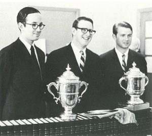 In 1968, Walt Kelly, center, after BC Law’s first National Moot Court championship.