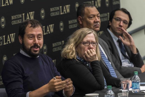 Coverage of "After Charlottesville" event in East Wing 120 of the Law School. Participants included (L-R): Assist. Prof. Daniel Farbman; Cathleen Kaveney, Prof. of the Libby Chair; Dean Vincent Rougeau; and Vlad Perju, Assoc. Dir. of the Clough Center for the Study of Constitutional Democracy; all BC Law.