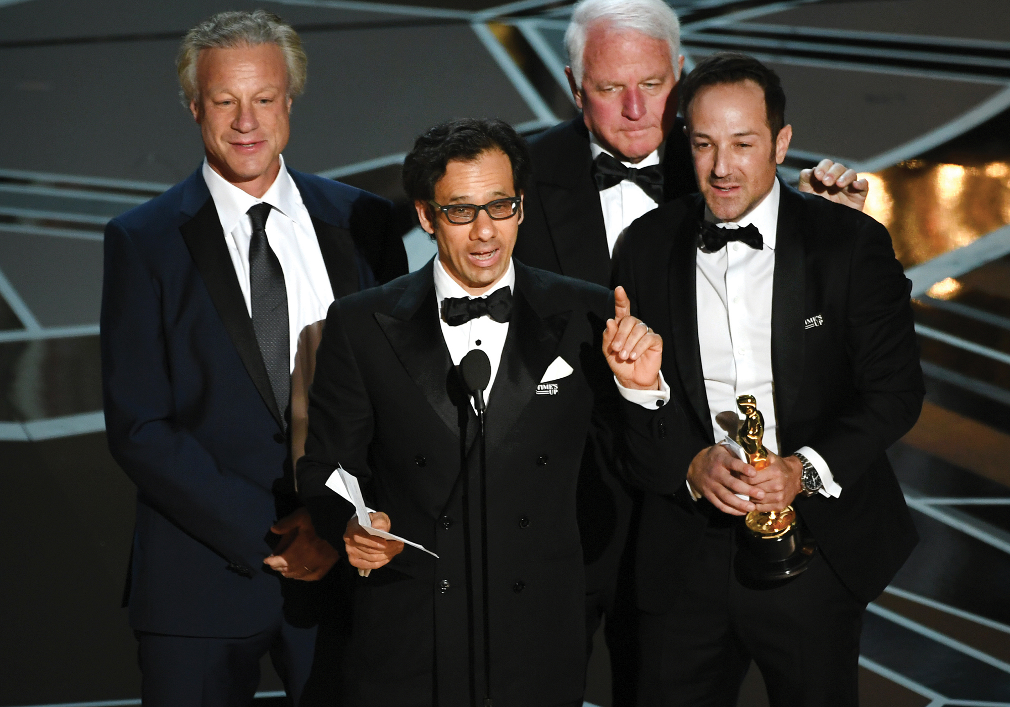 David Fialkow, director Dan Cogan, producer James R. Swartz, and director Bryan Fogel accept Best Documentary Feature for Icarusduring the 90th Annual Academy Awards. Credit: Kevin Winter/Getty Images