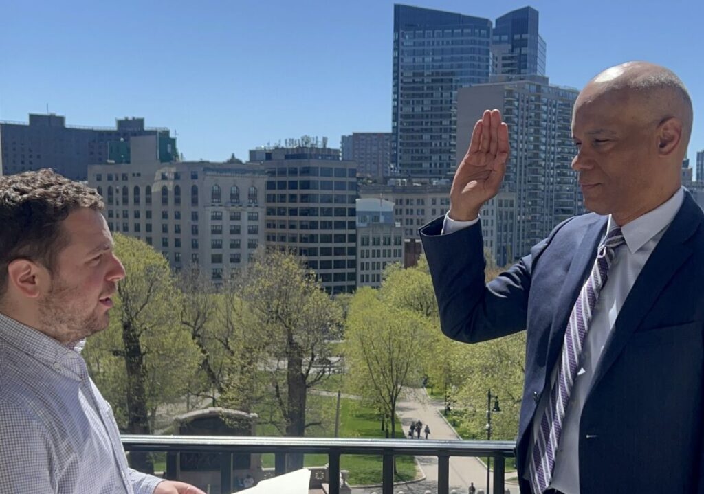thomas mitchell being sworn in as state commissioner